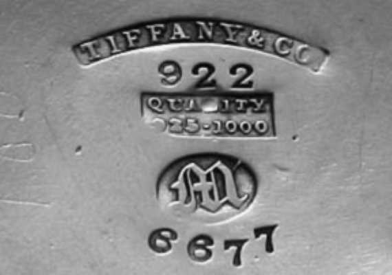 Tiffany & Co. silver marks: maker's name, pattern number 922, the 925-1000 quality stamp, the Old English M date letter, and order number 6677